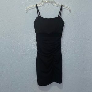 Emerald Sundae xxs mini black dress with slit on side and mesh stomach
